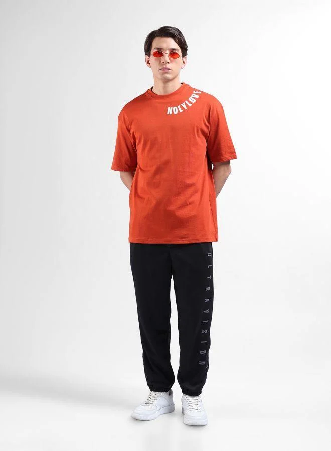 The Indian Garage Co  Men Relaxed Fit Embroidered Side Pocket Mid-Rise Joggers for Men | Best Price UAE